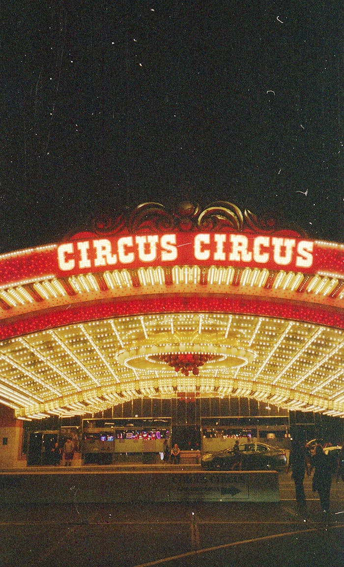Vibrant entrance of Circus Circus Hotel lit up at night in Las Vegas, Nevada.