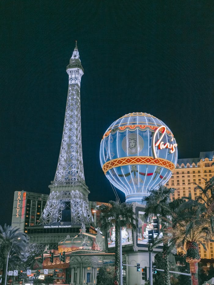 Captivating night scene of Paris Las Vegas with the Eiffel Tower and illuminated balloon.